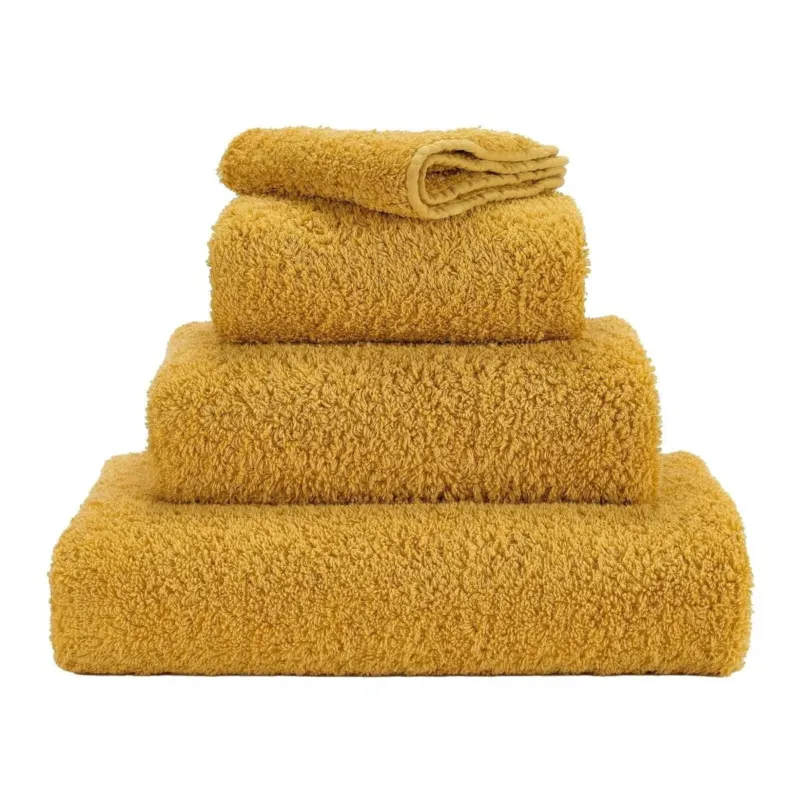 Super Pile Bath Towels by Abyss & Habidecor | 850 Safran - |VESIMI Design| Luxury and Rustic bathrooms online